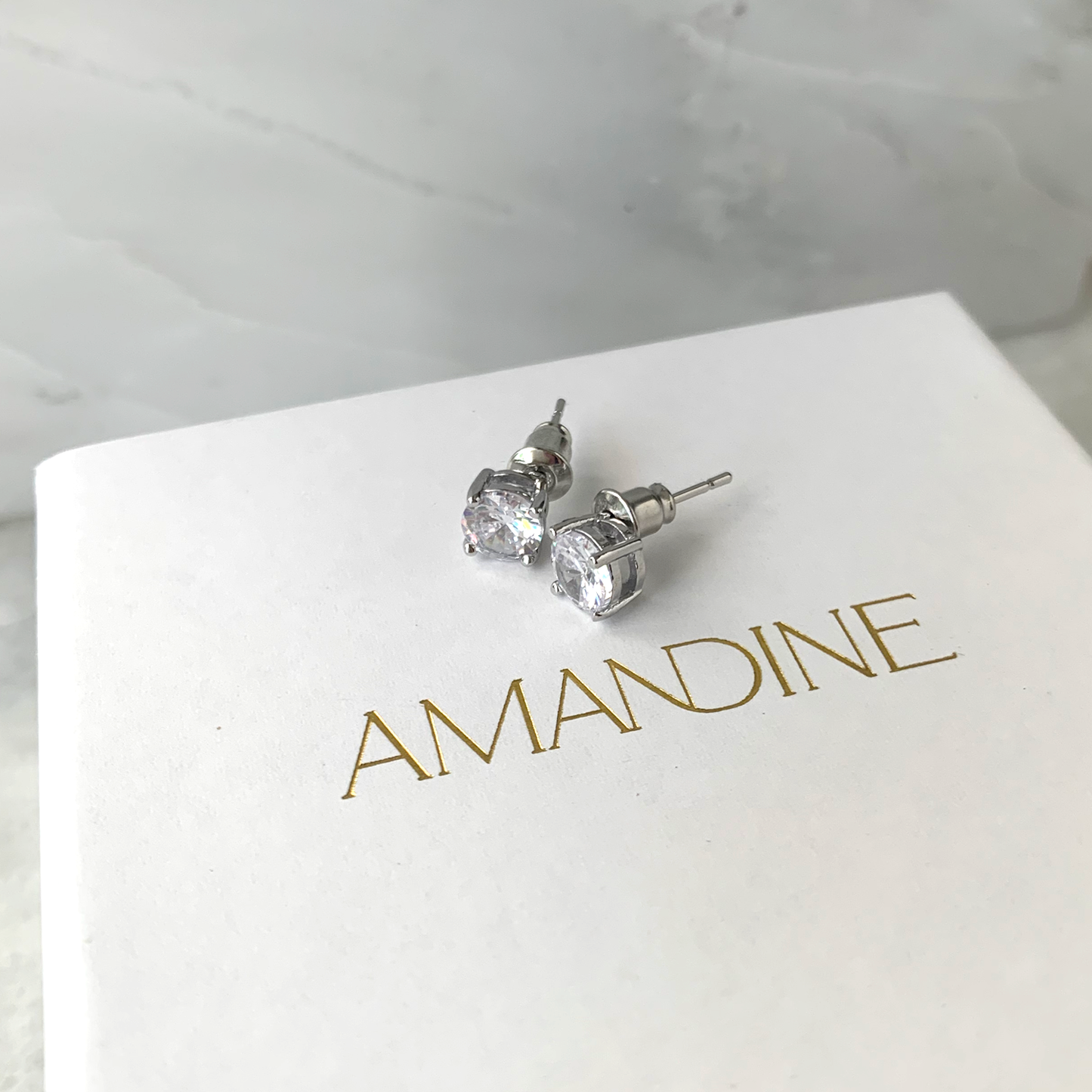 Solitaire Stud Earrings
